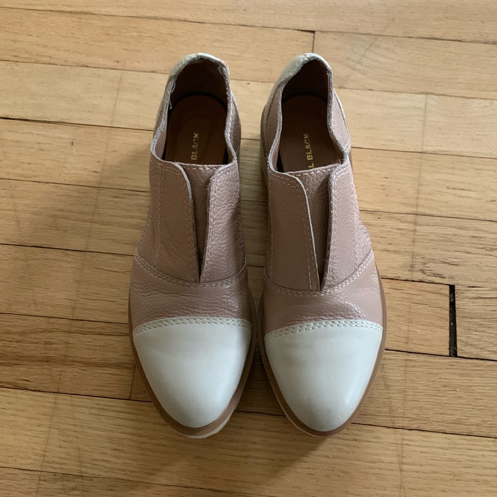 All Black platform slides.